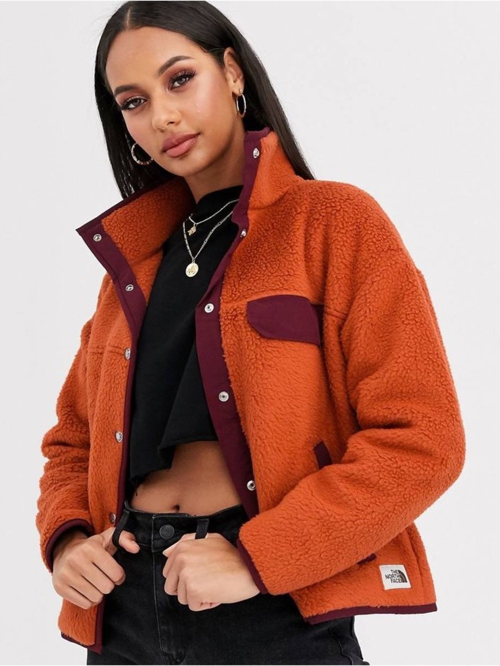 The North Face Cragmon orange Teddy Fleece Jacket with Burgundy Trim